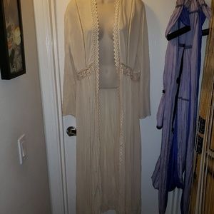 NanaMacs cream cardigan with crochet detail.